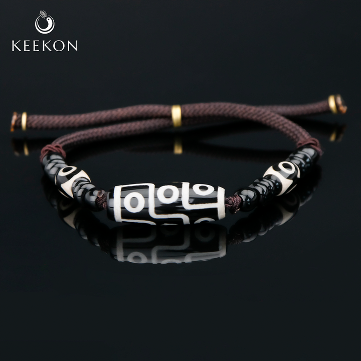 Tibetan Nine-Eye Dzi Bead Protection String Bracelet
