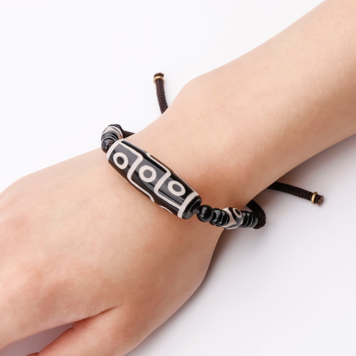 Tibetan Nine-Eye Dzi Bead Protection String Bracelet